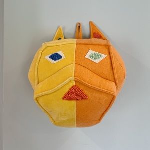 Domino x Crate & Barrel colorful dog head wall decor